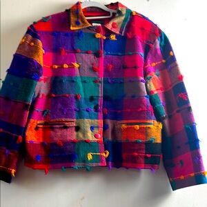 Estefanie’s 80% cotton and other fiber cropped fringed jacket